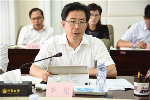 校长何建国